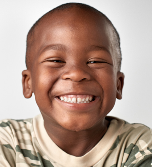 Portrait of happy, smiling young boy