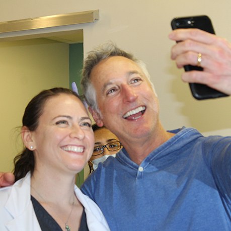 Cumming Georgia orthodontist and patient taking selfie together