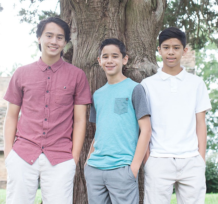 Three teen boys with braces and retainers