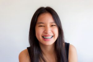 Smiling teen girl with braces